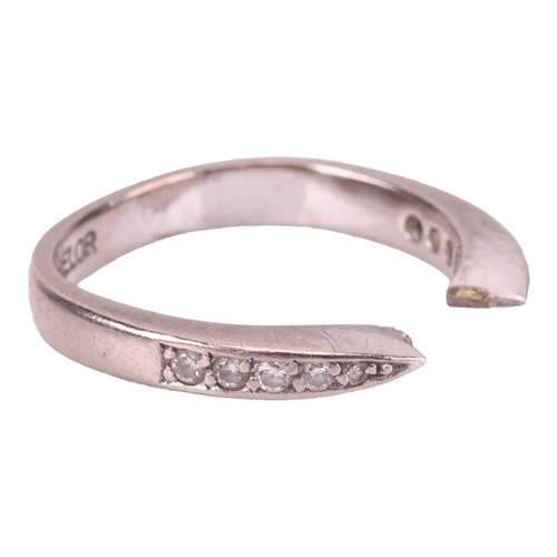 132 - A diamond-set open ring, tapered shoulders set with graduated brilliant-cut diamonds with an estimat... 