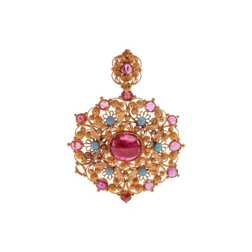 135 - An early to mid-19th century filigree work gem-set pendant; shaped circular set with cabochon ruby a... 