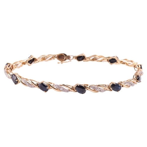 15 - A gem-set bracelet in 9ct gold, comprising of a series of bi-coloured links of twisted design, illus... 