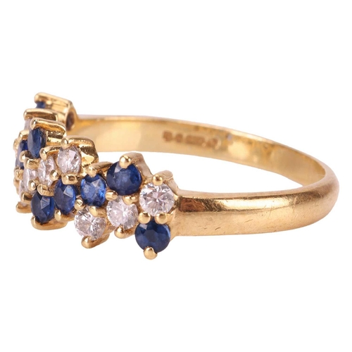 2 - An 18ct sapphire and diamond line ring, with alternating diagonal lines of round cut diamonds and sa... 