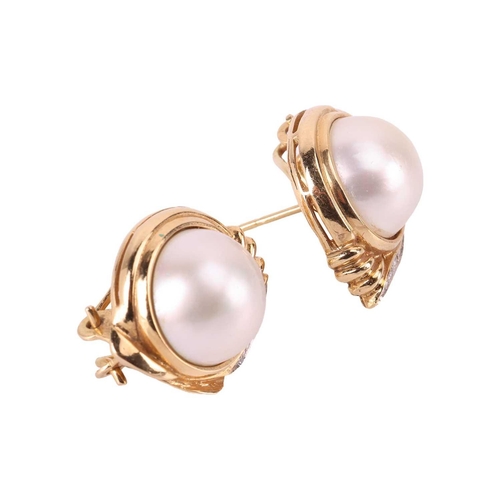 23 - A pair of mabe pearl earrings, featuring cultured mabe pearls with a diameter of 12.5 cm each, set w... 