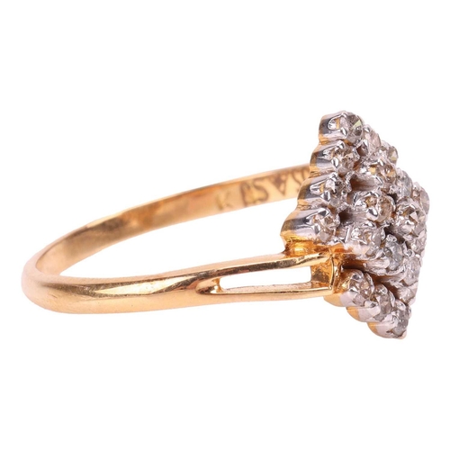 33 - A diamond cluster ring, featuring a cluster of prong-set diamonds in geometric pattern, to split-sho... 