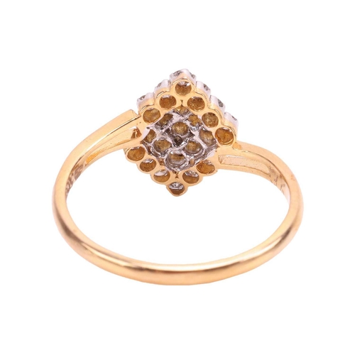 33 - A diamond cluster ring, featuring a cluster of prong-set diamonds in geometric pattern, to split-sho... 