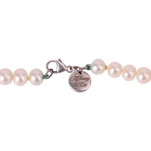 37 - Tiffany & Co. - a cultured pearl necklace, comprising a row of potato-shaped cultured pearls of 6.0 ... 