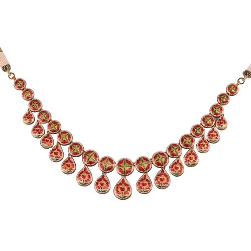 48 - An Indian diamond-set fringe necklace and matching drop earrings; the necklace comprising a series o... 