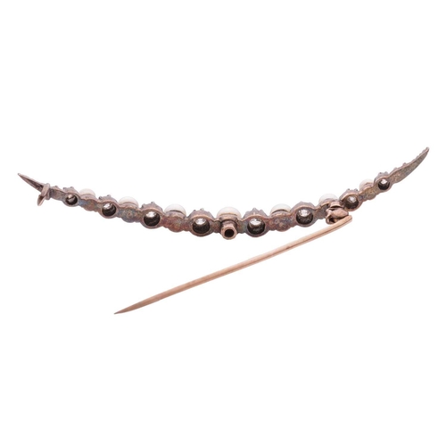 60 - A Victorian pearl and diamond crescent brooch, comprising a single row of alternating, graduated mix... 