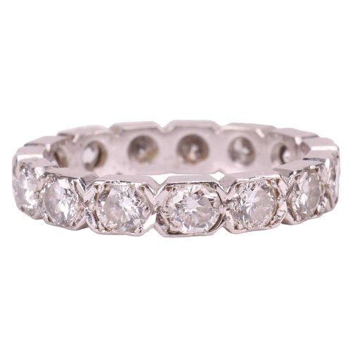 78 - A diamond eternity ring in platinum, with an estimated total diamond weight of 2.16ct, fifteen round... 