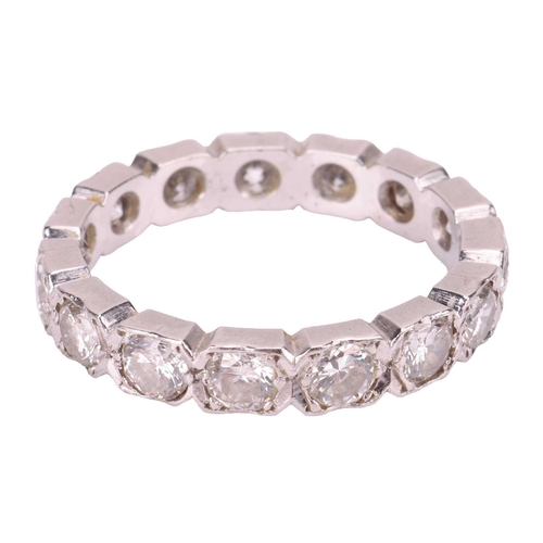 78 - A diamond eternity ring in platinum, with an estimated total diamond weight of 2.16ct, fifteen round... 