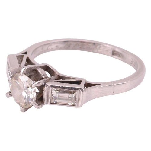 92 - A diamond trilogy ring, with an estimated 0.96ct of diamonds in total, claw-set with a round brillia... 