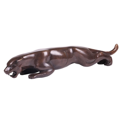 105 - A large Art Deco style bronze figure of a prowling panther, contemporary, 13 cm high x 66 cm x 12 cm... 