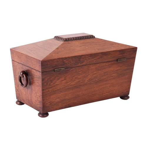 109 - A William IV figured rosewood sarcophagus two-section tea caddy, with a central blending bowl, suppo... 