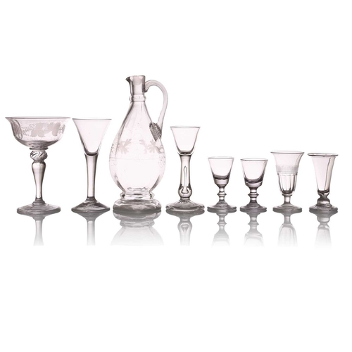 130 - A collection of 18th/19th-century drinking glasses and a wine ewer including a balustroid stemmed al... 