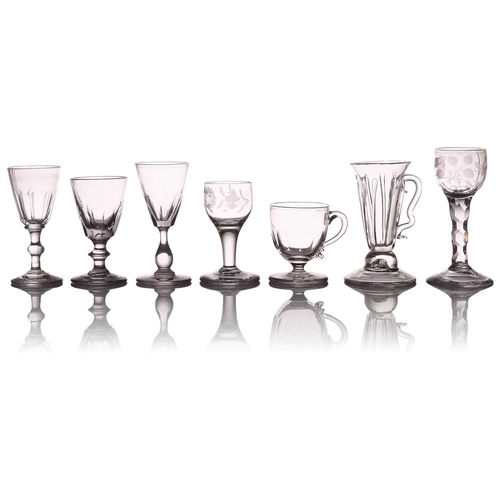 130 - A collection of 18th/19th-century drinking glasses and a wine ewer including a balustroid stemmed al... 