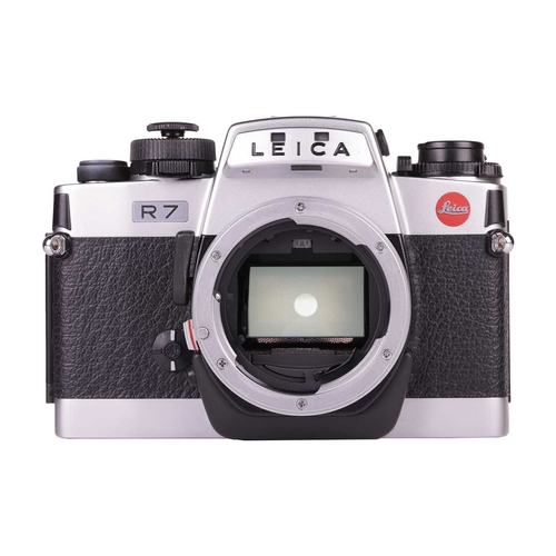 141 - A Leica R7 'Chrome' SLR Camera, made in Germany, serial no 1924520, 1992, with original box and pape... 