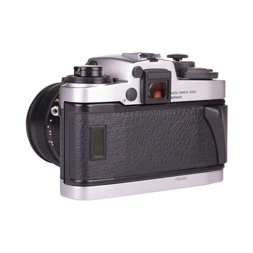 141 - A Leica R7 'Chrome' SLR Camera, made in Germany, serial no 1924520, 1992, with original box and pape... 