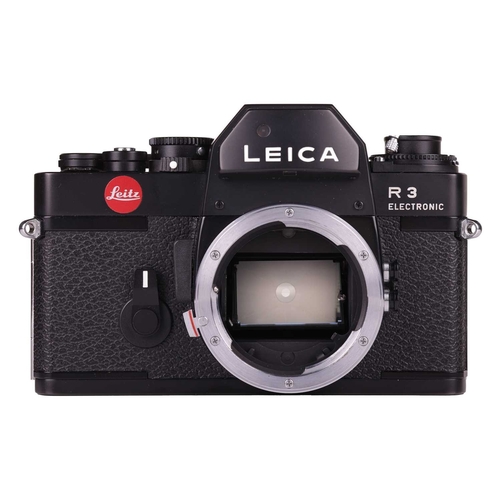 142 - A Leica R3 Electronic Camera body, No.1463715, made in Portugal, in black, with paperwork manual, ta... 