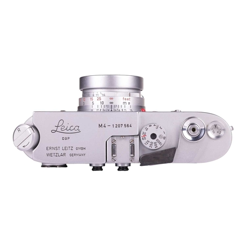 143 - A Leica M4 Rangefinder Camera,1970, chrome, serial no. 1207564, fitted with a Leitz Elmar 1:2.8/50mm... 