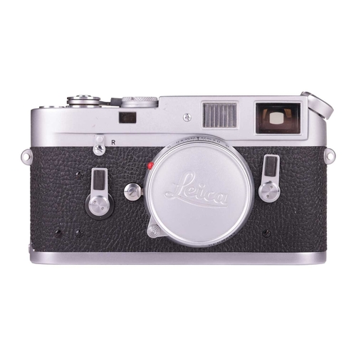 143 - A Leica M4 Rangefinder Camera,1970, chrome, serial no. 1207564, fitted with a Leitz Elmar 1:2.8/50mm... 