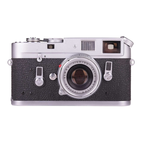 143 - A Leica M4 Rangefinder Camera,1970, chrome, serial no. 1207564, fitted with a Leitz Elmar 1:2.8/50mm... 