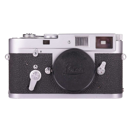 148 - A Leica M2 Rangefinder Camera Body, 1964, chrome, serial number 1092949, with brown leather Leica ca... 