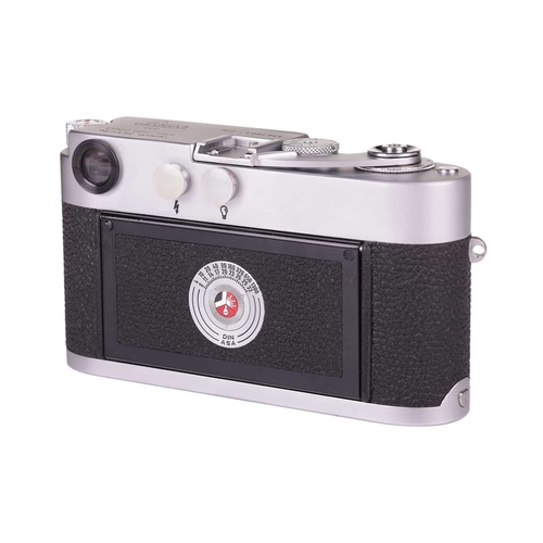 148 - A Leica M2 Rangefinder Camera Body, 1964, chrome, serial number 1092949, with brown leather Leica ca... 