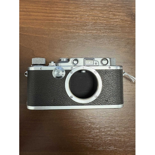 150 - A Leitz Wetzlar Leica IIIa Rangefinder Camera, 1935, serial number 162445, with brown leather Leica ... 