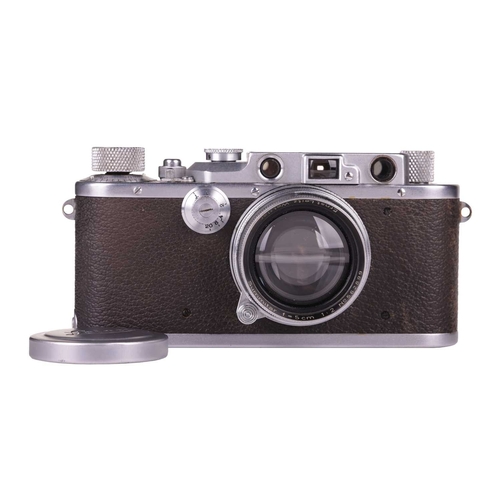 150 - A Leitz Wetzlar Leica IIIa Rangefinder Camera, 1935, serial number 162445, with brown leather Leica ... 