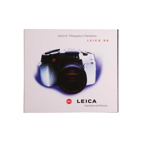 152 - A Leica R8 SLR Camera, 2000, black, serial no. 2476807, in original box with warranty paperwork (now... 