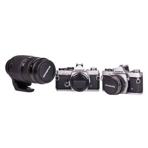 154 - An Olympus Zuiko Digital ED Lens, 50-200mm f2.8-3.5, with front and rear covers, fitted with an Olym... 