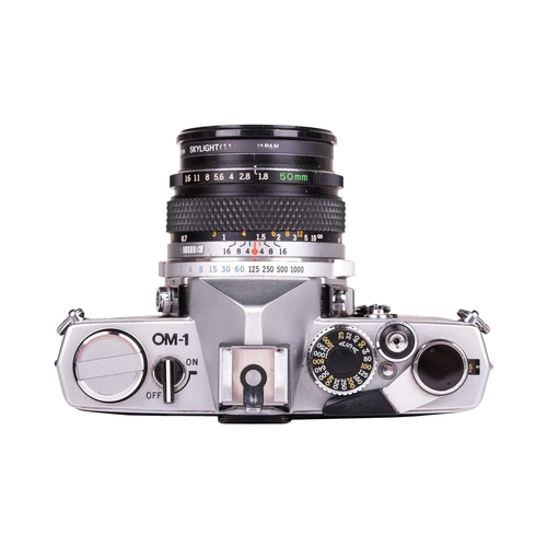 154 - An Olympus Zuiko Digital ED Lens, 50-200mm f2.8-3.5, with front and rear covers, fitted with an Olym... 