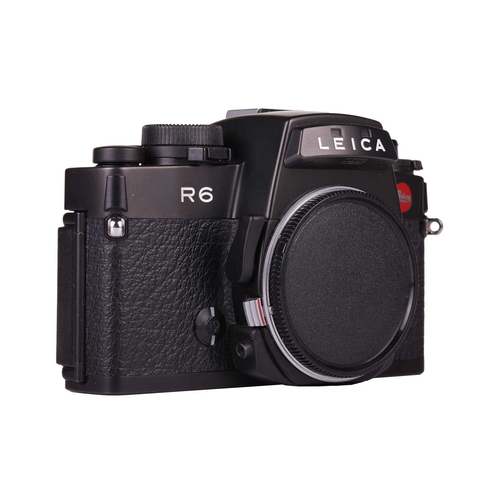 155 - A Leica R6 SLR Camera body, 1987, Made in Germany, black, serial no. 1729282, in original case and b... 