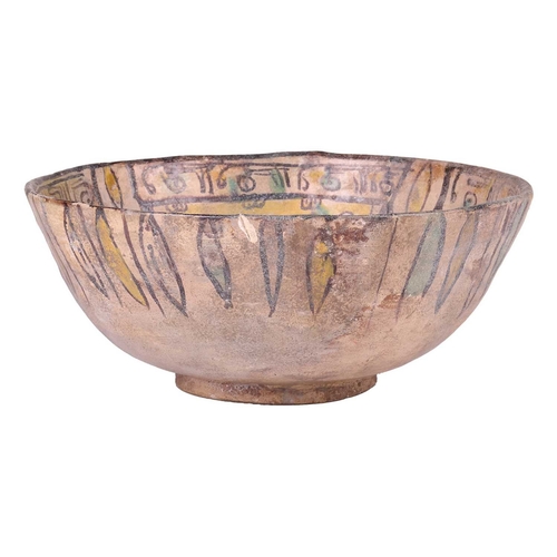 41 - A Nishapur polychromic circular pottery bowl, 10th century, the interior with segmented panels of pe... 