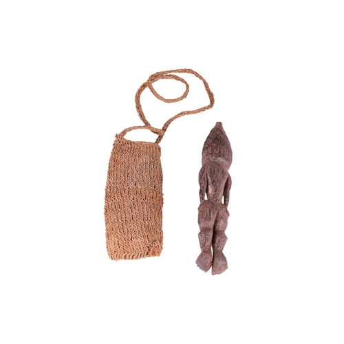 49 - A Melanesian/old Papuan New Guinea Ramu River region 'Hunting Charm', in the form of a carved wood a... 