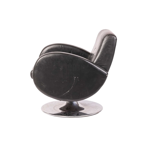 50 - A 'Mid Century Vintage' black leather swivel armchair, with rollover arms and spreading chrome disc ... 