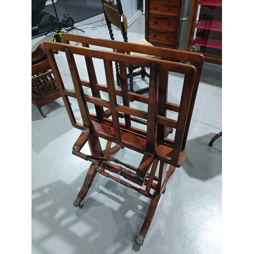 55 - A small George IV mahogany folding artist's folio stand with a pair of hinged lath panels on trestle... 