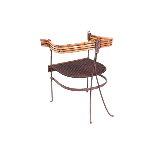 59 - A Continental (possibly Italian) Modernist chair, with curved bamboo back, iron seat and frame, on f... 