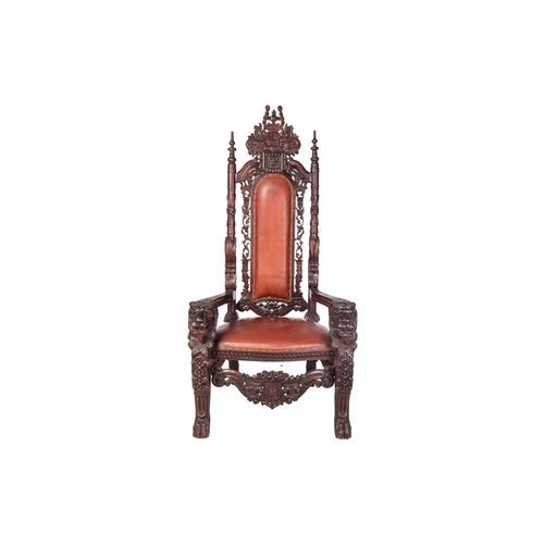 60 - A large, almost theatrical, heavily carved masters-type open throne chair with turned and carved bac... 