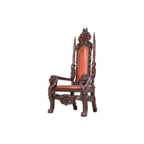 60 - A large, almost theatrical, heavily carved masters-type open throne chair with turned and carved bac... 