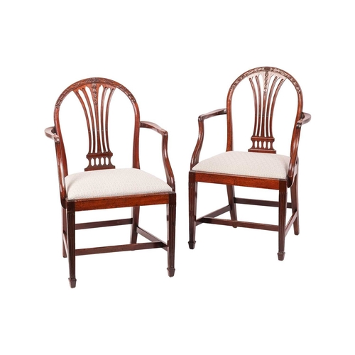 61 - A set of six early 19th-century Hepplewhite design mahogany dining chairs with arched backs and bull... 