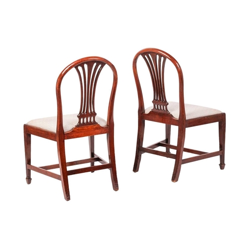 61 - A set of six early 19th-century Hepplewhite design mahogany dining chairs with arched backs and bull... 