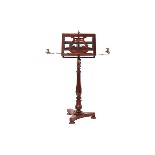 69 - An early 19th century figured rosewood duet music stand, C1830, with two ratcheting music rests with... 