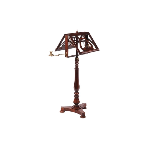 69 - An early 19th century figured rosewood duet music stand, C1830, with two ratcheting music rests with... 