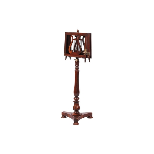 69 - An early 19th century figured rosewood duet music stand, C1830, with two ratcheting music rests with... 