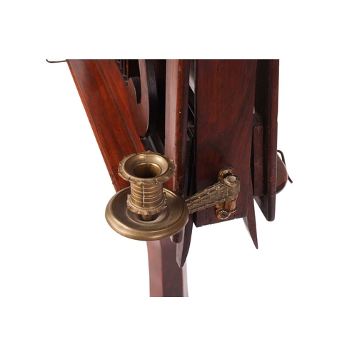 69 - An early 19th century figured rosewood duet music stand, C1830, with two ratcheting music rests with... 