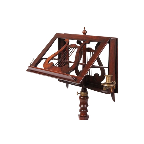 69 - An early 19th century figured rosewood duet music stand, C1830, with two ratcheting music rests with... 