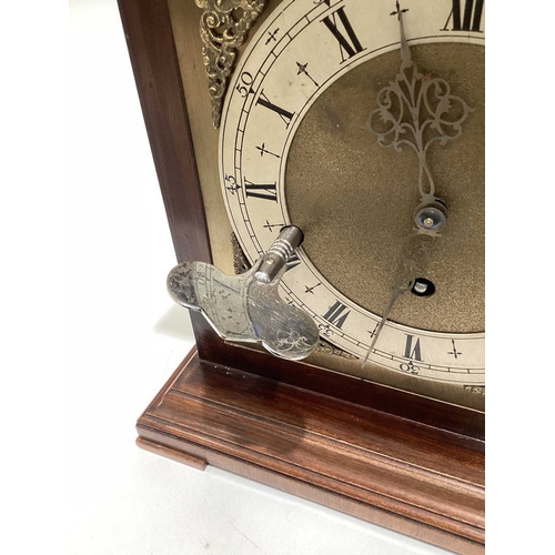 73 - A mid-century bracket clock with a commemorative plaque, measures 41 cm tall.