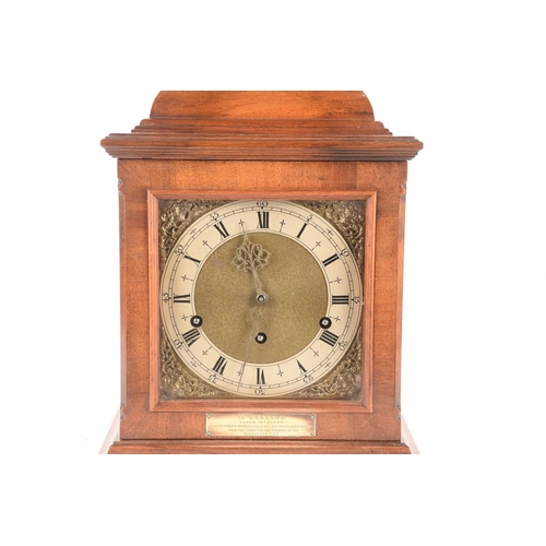 73 - A mid-century bracket clock with a commemorative plaque, measures 41 cm tall.