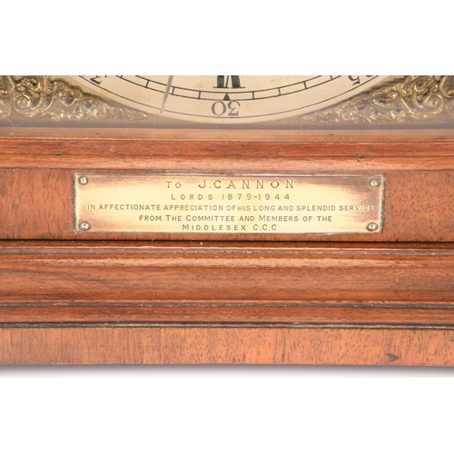 73 - A mid-century bracket clock with a commemorative plaque, measures 41 cm tall.