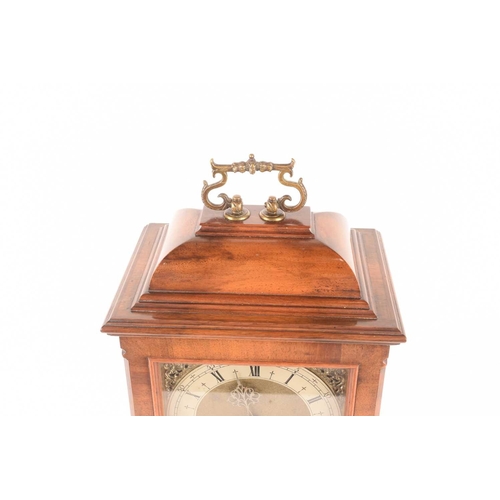 73 - A mid-century bracket clock with a commemorative plaque, measures 41 cm tall.