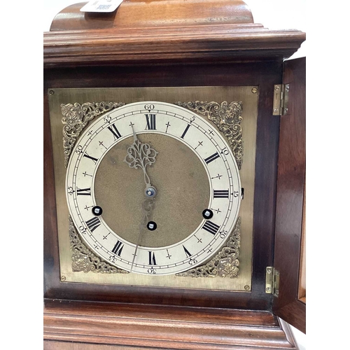 73 - A mid-century bracket clock with a commemorative plaque, measures 41 cm tall.